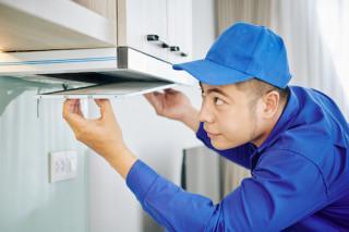 handyman-installing-cooker-hood-2021-08-27-21-23-56-utc